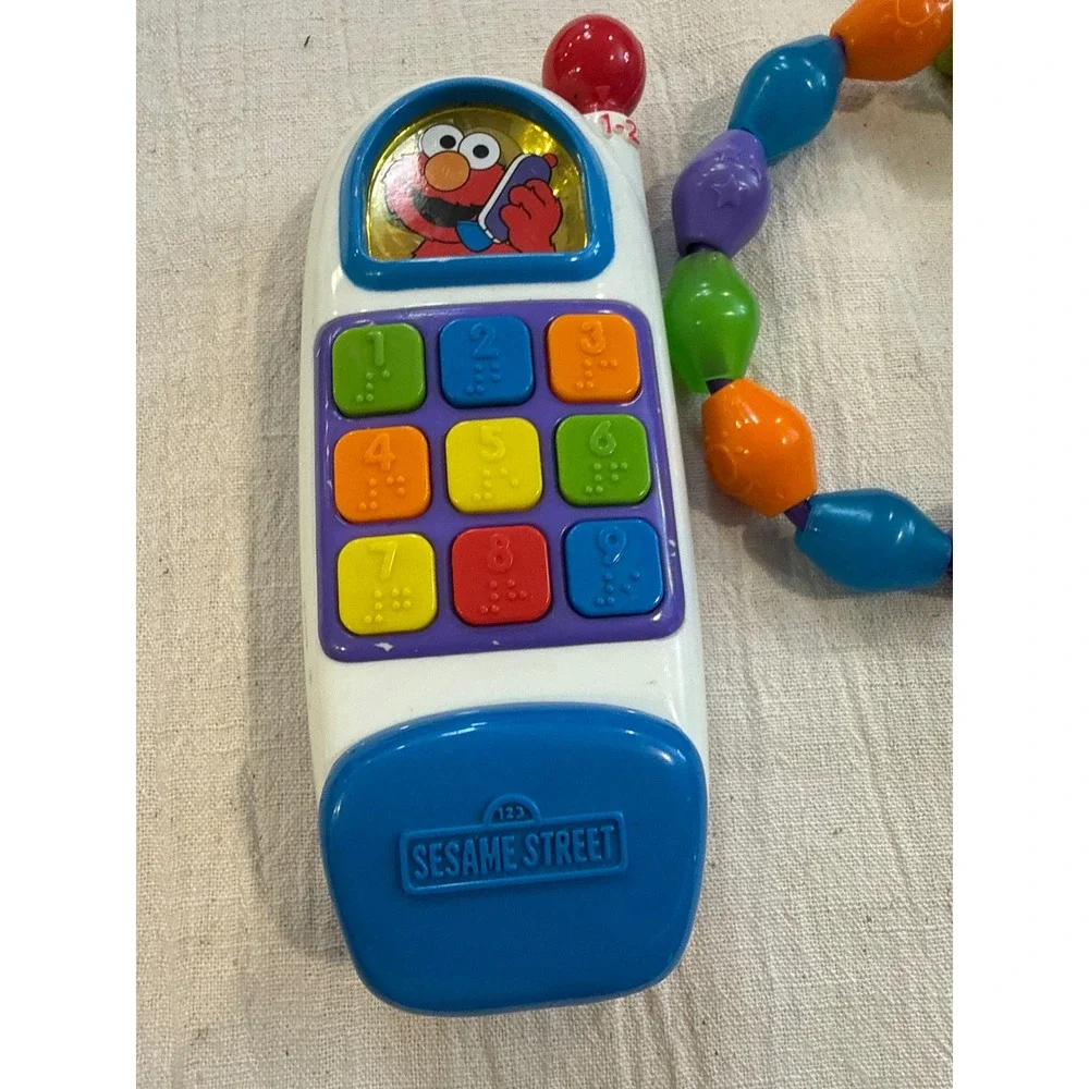 Sesame Street Elmo Flip Phone Toy and Colorful Bead Rattle Set Multi Color